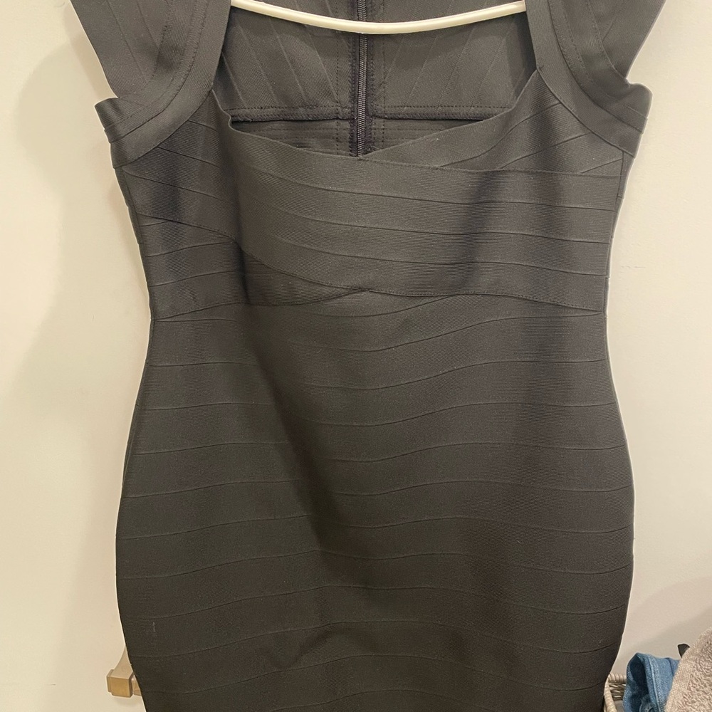 Bandage sretch dress; sexy, and very couture..  Never worn.  Bought in Korea. .